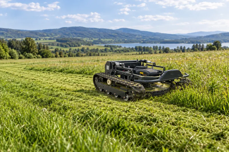 Remote control lawn mower cutting a large grassy area